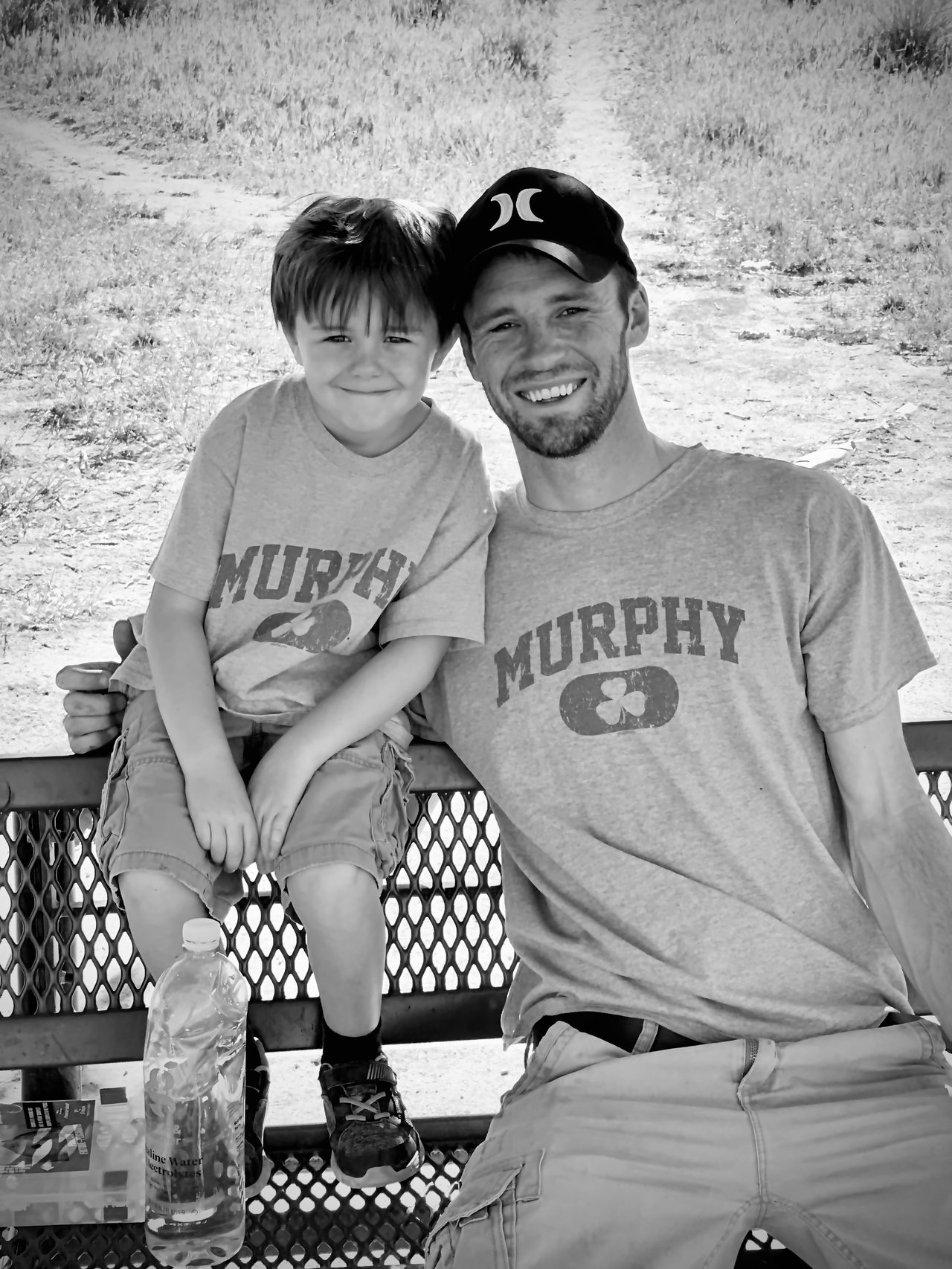 Justin Murphy and his young son wearing Murphy shamrock t-shirts